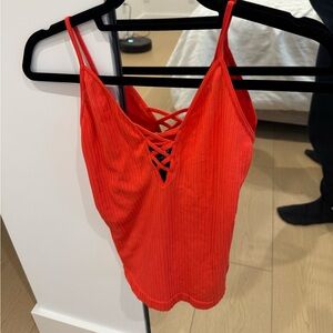 BEBE poppy red tank with cleavage